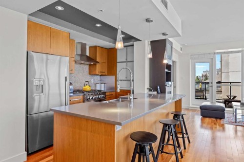 701-10 Shawnee Hill Sw, Calgary, AB - Indoor Photo Showing Kitchen With Double Sink