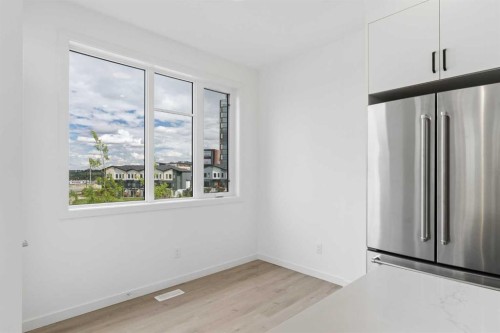 11-1453 Na'A Drive Sw, Calgary, AB - Indoor Photo Showing Other Room