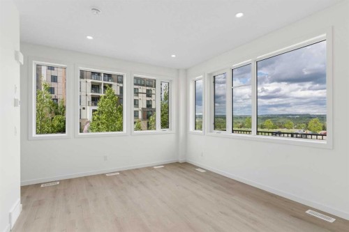 11-1453 Na'A Drive Sw, Calgary, AB - Indoor Photo Showing Other Room