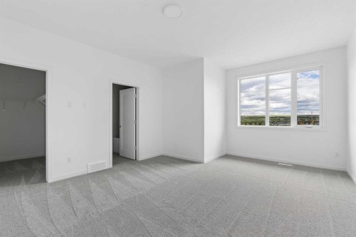 11-1453 Na'A Drive Sw, Calgary, AB - Indoor Photo Showing Other Room