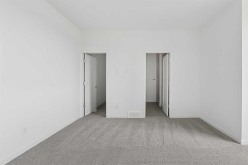 11-1453 Na'A Drive Sw, Calgary, AB - Indoor Photo Showing Other Room