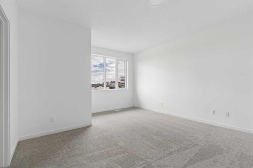 11-1453 Na'A Drive Sw, Calgary, AB - Indoor Photo Showing Other Room