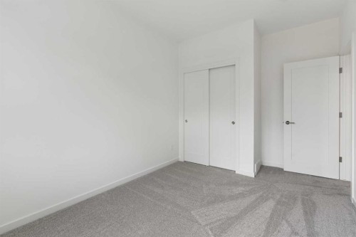 11-1453 Na'A Drive Sw, Calgary, AB - Indoor Photo Showing Other Room