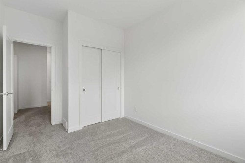 11-1453 Na'A Drive Sw, Calgary, AB - Indoor Photo Showing Other Room