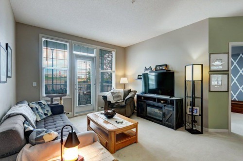 123-1 Crystal Green, Okotoks, AB - Indoor Photo Showing Living Room