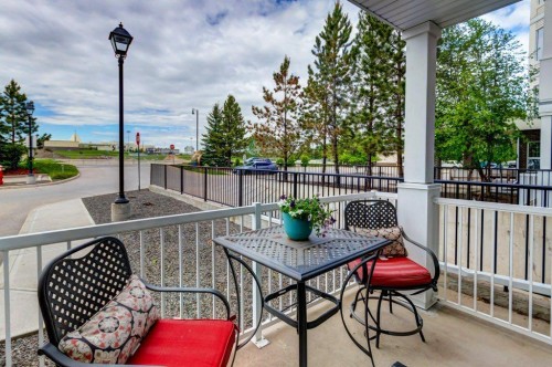123-1 Crystal Green, Okotoks, AB - Outdoor With Deck Patio Veranda With Exterior