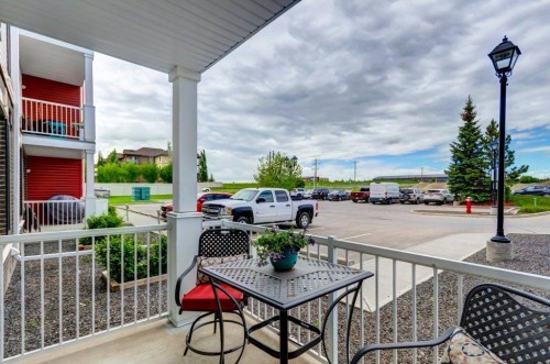 123-1 Crystal Green, Okotoks, AB - Outdoor With Balcony With Exterior
