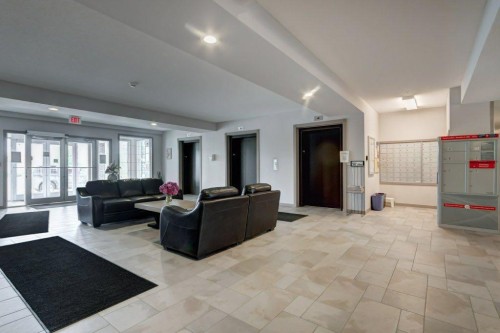 123-1 Crystal Green, Okotoks, AB - Indoor Photo Showing Other Room