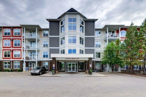 123-1 Crystal Green, Okotoks, AB - Outdoor With Balcony With Facade