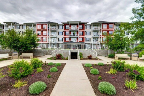 123-1 Crystal Green, Okotoks, AB - Outdoor With Balcony With Facade