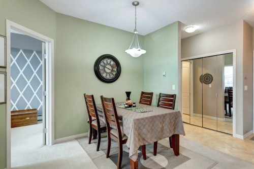 123-1 Crystal Green, Okotoks, AB - Indoor Photo Showing Dining Room