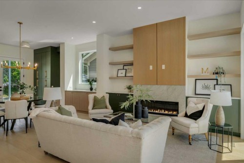 3917 23 Avenue Sw, Calgary, AB - Indoor Photo Showing Living Room With Fireplace