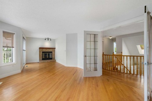112 Hawkford Crescent Nw, Calgary, AB - Indoor With Fireplace