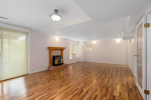 112 Hawkford Crescent Nw, Calgary, AB - Indoor With Fireplace