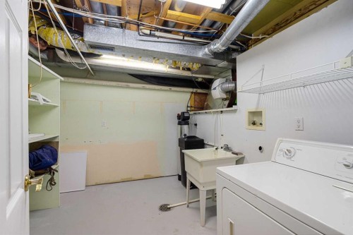 112 Hawkford Crescent Nw, Calgary, AB - Indoor Photo Showing Laundry Room
