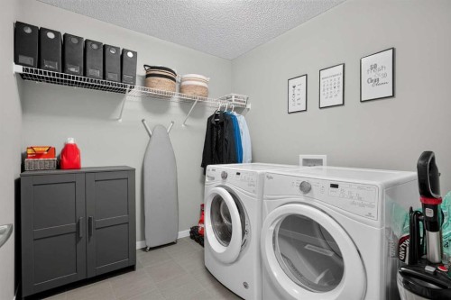 412 Nolanlake Villas Nw, Calgary, AB - Indoor Photo Showing Laundry Room