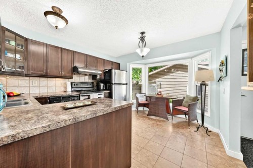 63 Strathcona Crescent Sw, Calgary, AB 
