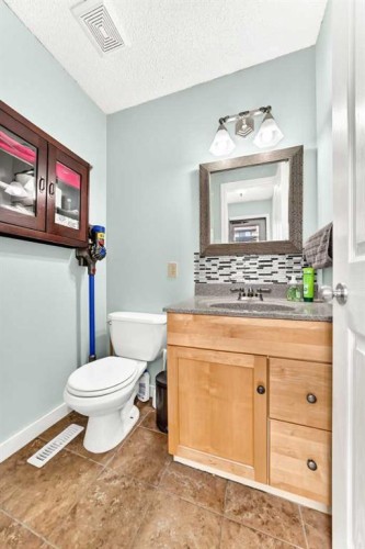 63 Strathcona Crescent Sw, Calgary, AB 