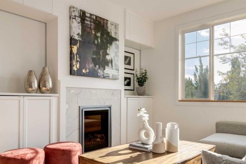 804-281 Cougar Ridge Drive Sw, Calgary, AB - Indoor With Fireplace