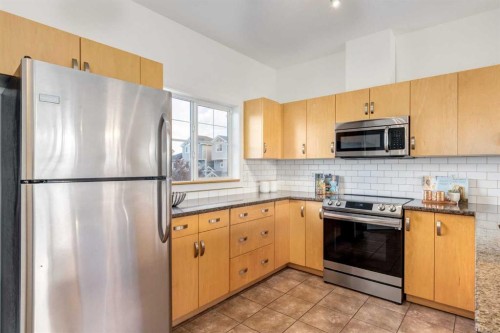 804-281 Cougar Ridge Drive Sw, Calgary, AB - Indoor Photo Showing Kitchen