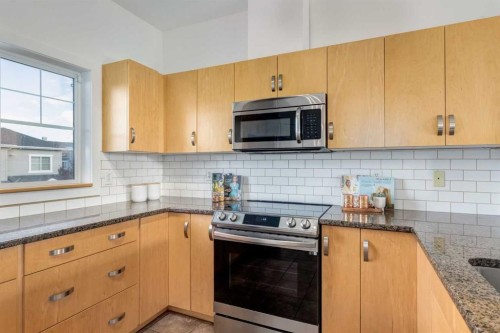 804-281 Cougar Ridge Drive Sw, Calgary, AB - Indoor Photo Showing Kitchen