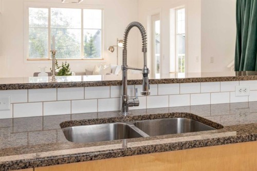 804-281 Cougar Ridge Drive Sw, Calgary, AB - Indoor Photo Showing Kitchen With Double Sink