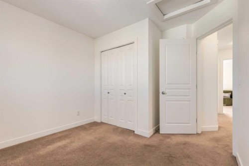 804-281 Cougar Ridge Drive Sw, Calgary, AB - Indoor Photo Showing Other Room