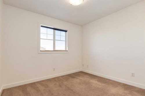 804-281 Cougar Ridge Drive Sw, Calgary, AB - Indoor Photo Showing Other Room