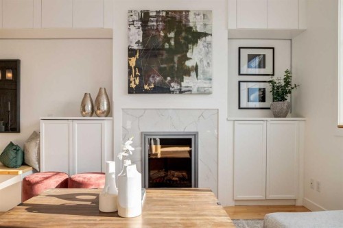 804-281 Cougar Ridge Drive Sw, Calgary, AB - Indoor With Fireplace