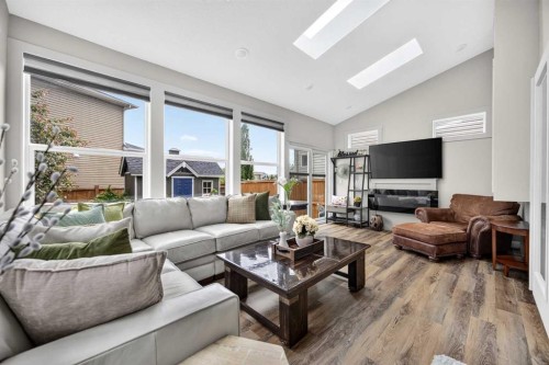2029 Luxstone Boulevard Sw, Airdrie, AB - Indoor Photo Showing Living Room With Fireplace