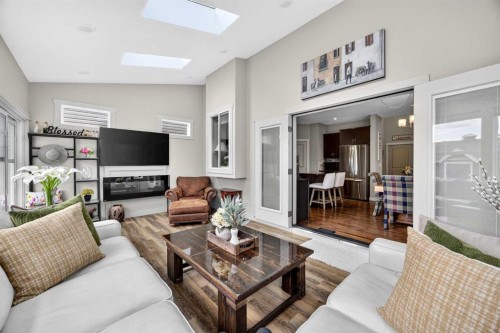 2029 Luxstone Boulevard Sw, Airdrie, AB - Indoor Photo Showing Living Room With Fireplace