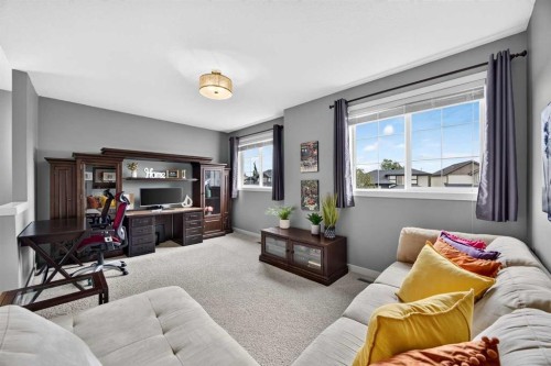 2029 Luxstone Boulevard Sw, Airdrie, AB - Indoor Photo Showing Living Room