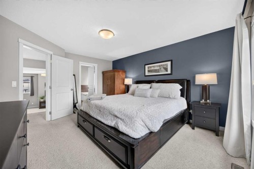 2029 Luxstone Boulevard Sw, Airdrie, AB - Indoor Photo Showing Bedroom