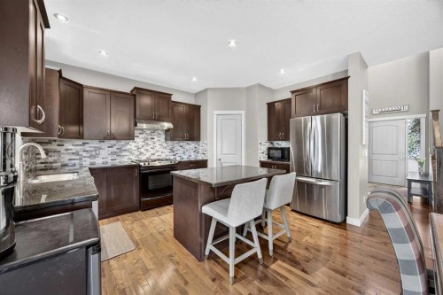 2029 Luxstone Boulevard Sw, Airdrie, AB - Indoor Photo Showing Kitchen With Upgraded Kitchen