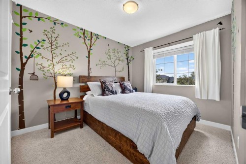 2029 Luxstone Boulevard Sw, Airdrie, AB - Indoor Photo Showing Bedroom