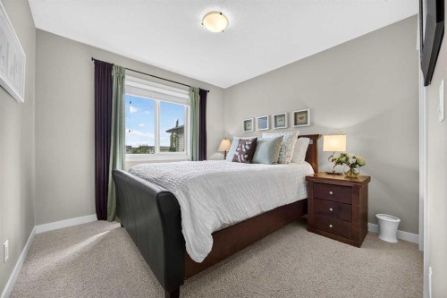 2029 Luxstone Boulevard Sw, Airdrie, AB - Indoor Photo Showing Bedroom