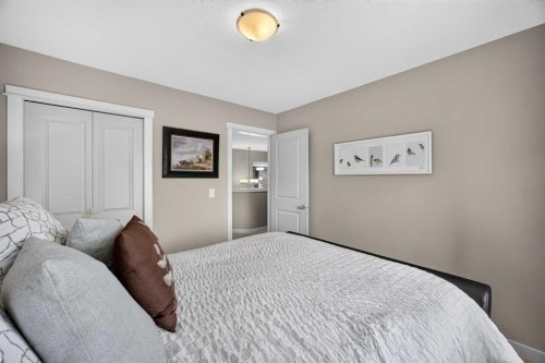 2029 Luxstone Boulevard Sw, Airdrie, AB - Indoor Photo Showing Bedroom