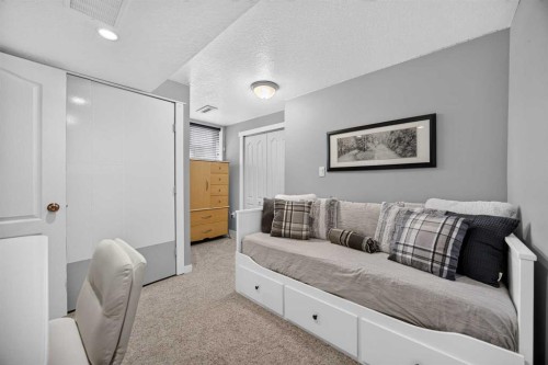 2029 Luxstone Boulevard Sw, Airdrie, AB - Indoor Photo Showing Bedroom