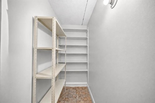 106-5204 Dalton Drive Nw, Calgary, AB - Indoor With Storage