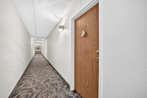 106-5204 Dalton Drive Nw, Calgary, AB - Indoor Photo Showing Other Room
