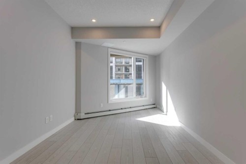 206-8370 Broadcast Avenue Sw, Calgary, AB - Indoor Photo Showing Other Room