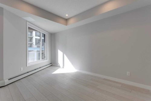 206-8370 Broadcast Avenue Sw, Calgary, AB - Indoor Photo Showing Other Room