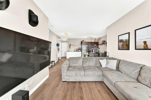 1406-325 3 Street Se, Calgary, AB - Indoor Photo Showing Living Room With Fireplace
