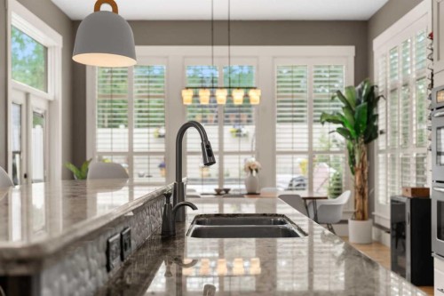 11 Aspen Cliff Place Sw, Calgary, AB - Indoor Photo Showing Kitchen With Double Sink With Upgraded Kitchen