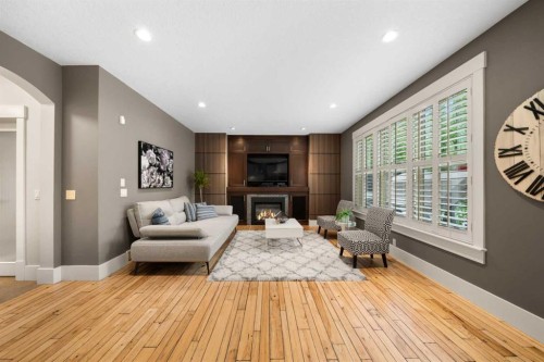 11 Aspen Cliff Place Sw, Calgary, AB - Indoor With Fireplace