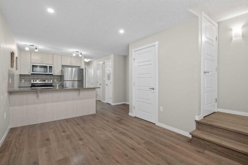 1910-7451 Falconridge Boulevard Ne, Calgary, AB - Indoor Photo Showing Kitchen