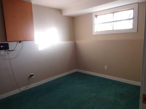 250 Falmere Way Ne, Calgary, AB - Indoor Photo Showing Other Room