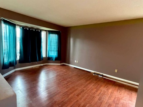 250 Falmere Way Ne, Calgary, AB - Indoor Photo Showing Other Room