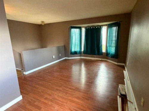 250 Falmere Way Ne, Calgary, AB - Indoor Photo Showing Other Room