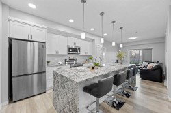 105-200 Harvest Hills Place NE Calgary, AB T3K 2N3